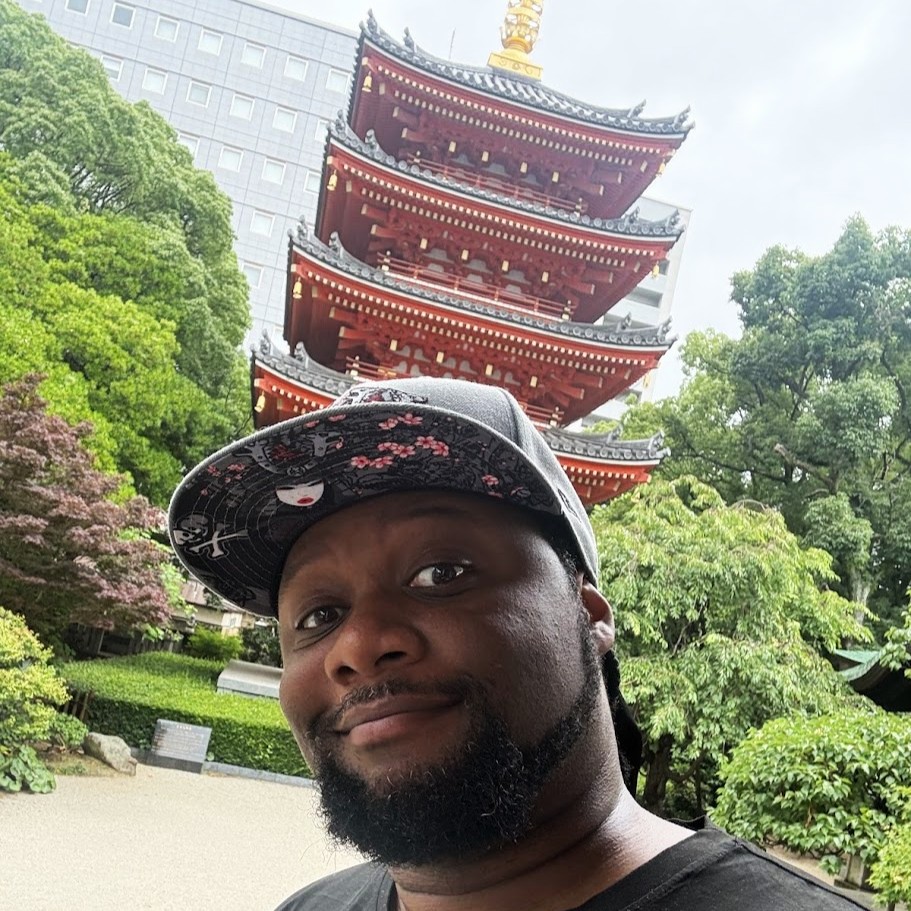 me in japan with a pagoda in the background